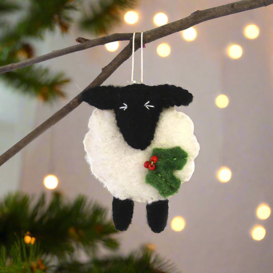 hand-felted black and white sheep holiday ornament made by fair trade artisans in Nepal and fair trade imported to the US.