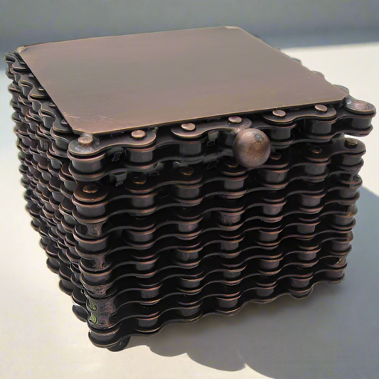 handmade metal box, square shaped, made from recycled steel bicycle chains by fair trade artisans.