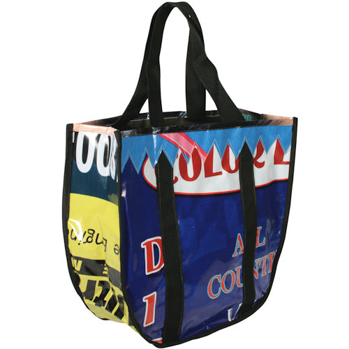 colorful open top shopping tote made from recycled plastic billboards and fair trade imported from India