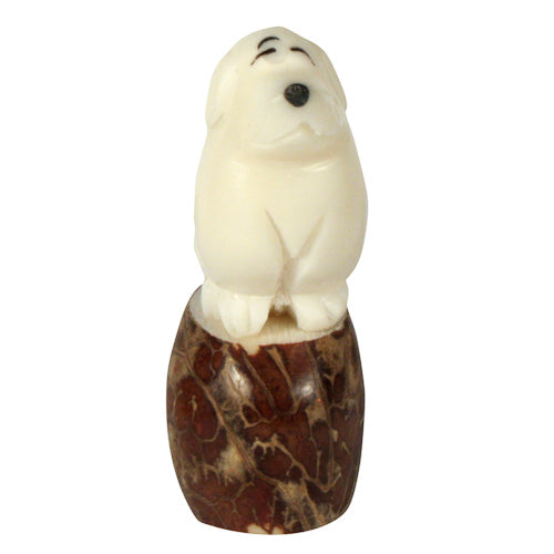 <center>Dutiful Dog Tagua Pet Figurine </br>Crafted by Artisans in Ecuador </br>Measures 2-1/2” high x 1” wide x 1-1/4” deep</center>