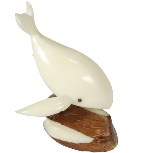 <center>Diving Whale Tagua Figurine </br>Crafted by Artisans in Ecuador </br>Measures 3-1/4” high x 2-1/4” wide x 2” deep</center>