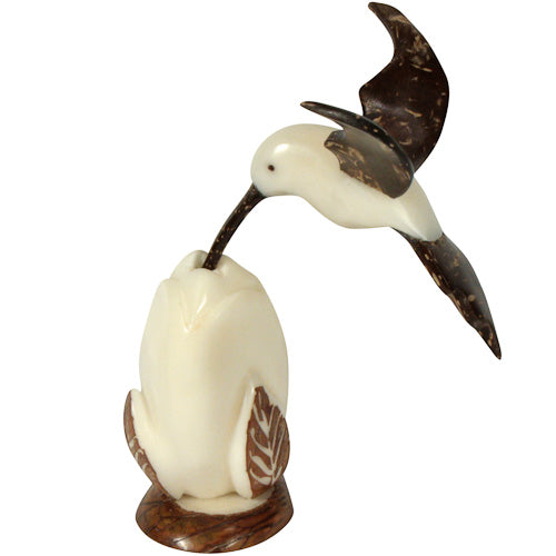 <center>Hummingbird Feeding Tagua Figurine with Coconut Wings - Side View</br>Crafted by Artisans in Ecuador </br>Measures 4-1/2” high x 2-1/2” wide x 3” deep</center>