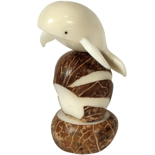 <center>Jumping Whale Tagua Figurine </br>Crafted by Artisans in Ecuador </br>Measures 3-1/2” high x 2” wide x 2” deep</center>