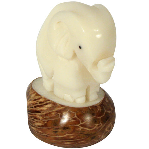 <center>Elephant Tagua Figurine </br>Crafted by Artisans in Ecuador </br>Measures 2-1/4” high x 1-1/4” wide x 1-3/4” long</center>