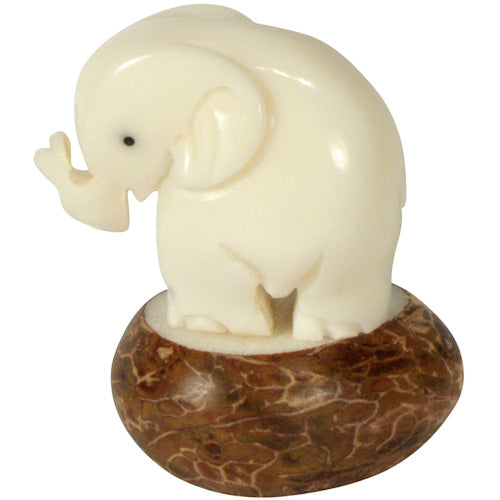 <center>Elephant Tagua Figurine </br>Crafted by Artisans in Ecuador </br>Measures 2-1/4” high x 1-1/4” wide x 1-3/4” long</center>