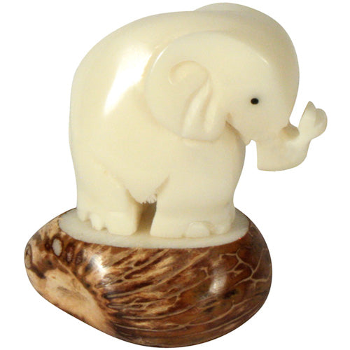 <center>Elephant Tagua Figurine </br>Crafted by Artisans in Ecuador </br>Measures 2-1/4” high x 1-1/4” wide x 1-3/4” long</center>