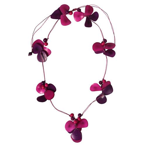 <center>Pink Tagua Slice and Bead Necklace by Artisans in Peru </br>Measures 20” drop x 1-1/2” wide, adjustable</center>