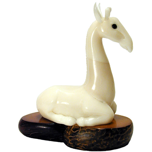 <center>Tagua Giraffe Figurine Carved by Artisans of Ecuador </br> Measures 3-3/4" high x 3-1/2" wide x 1-3/4" deep </center>