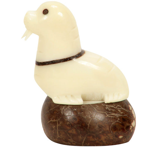<center>Tagua Walrus Figurine Carved by Artisans of Ecuador - Side View </br> Measures: 2-1/2” high x 1-1/2” wide x 2-1/4” deep</center>