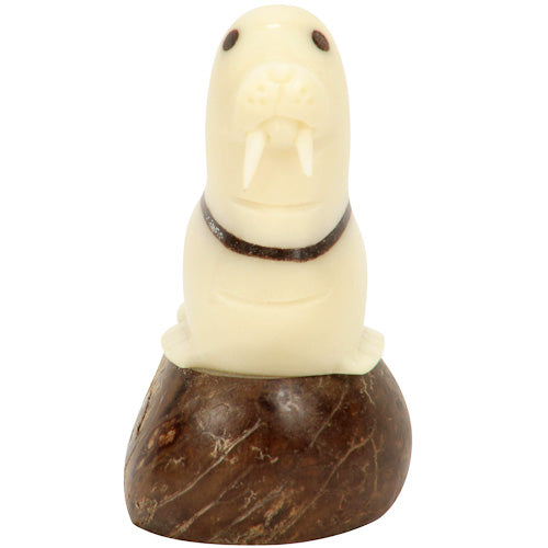 <center>Tagua Walrus Figurine Carved by Artisans of Ecuador - Front View</br> Measures: 2-1/2” high x 1-1/2” wide x 2-1/4” deep</center>