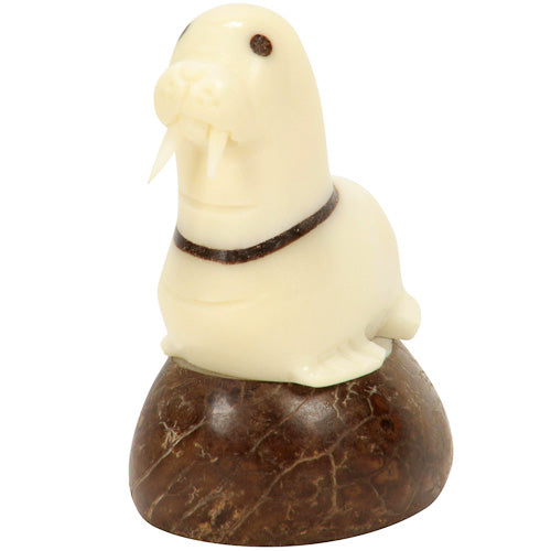 <center>Tagua Walrus Figurine Carved by Artisans of Ecuador </br> Measures: 2-1/2” high x 1-1/2” wide x 2-1/4” deep</center>