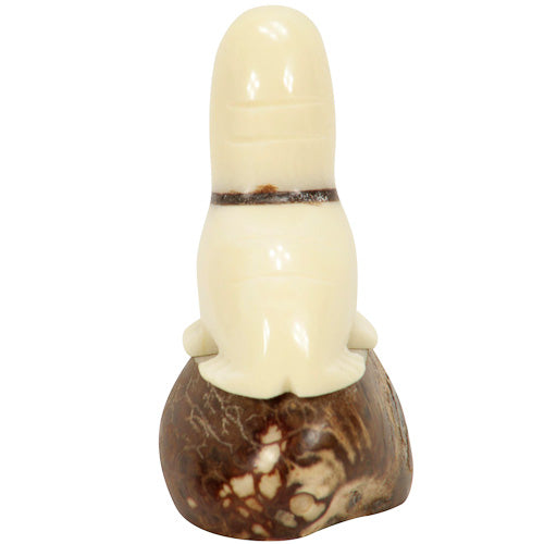 <center>Tagua Walrus Figurine Carved by Artisans of Ecuador - Back View</br> Measures: 2-1/2” high x 1-1/2” wide x 2-1/4” deep</center>