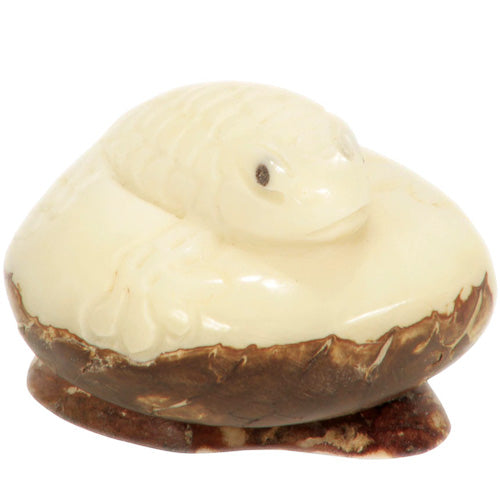 <center>Tagua Lizard Figurine Carved by Artisans of Ecuador - Front View</br> Measures: 1-3/4” high x 1-1/2” wide x 2-1/4” deep</center>