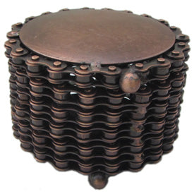 handmade round decorative box created by fair trade artists out of recycled steel and upcycled bicycle chain.