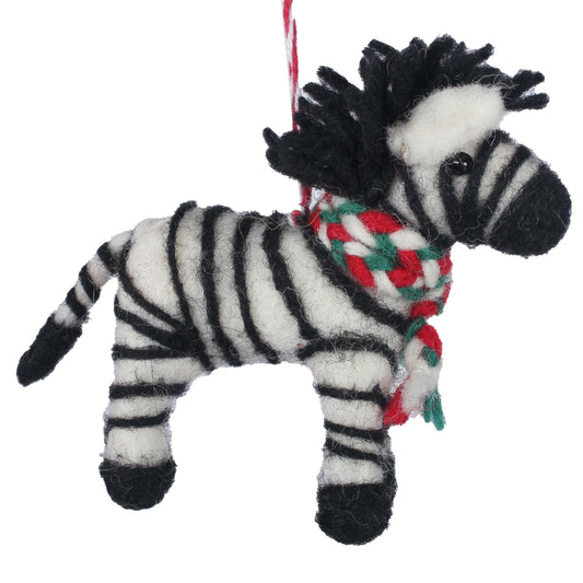 Plush zebra toy holiday tree ornament with a red and green scarf on a white background