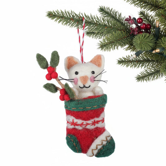 Cat in a red and green striped stocking Christmas ornament with holly leaves and berries.