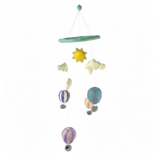 Children's mobile with stars, sun, and hot air balloons on a white background