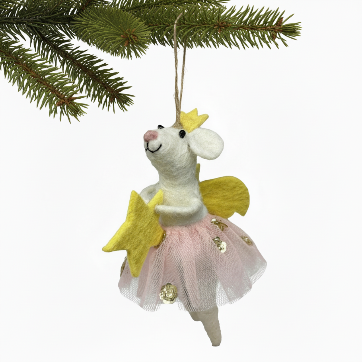Fairy mouse ornament with yellow wings and pink skirt hanging from a Christmas tree.