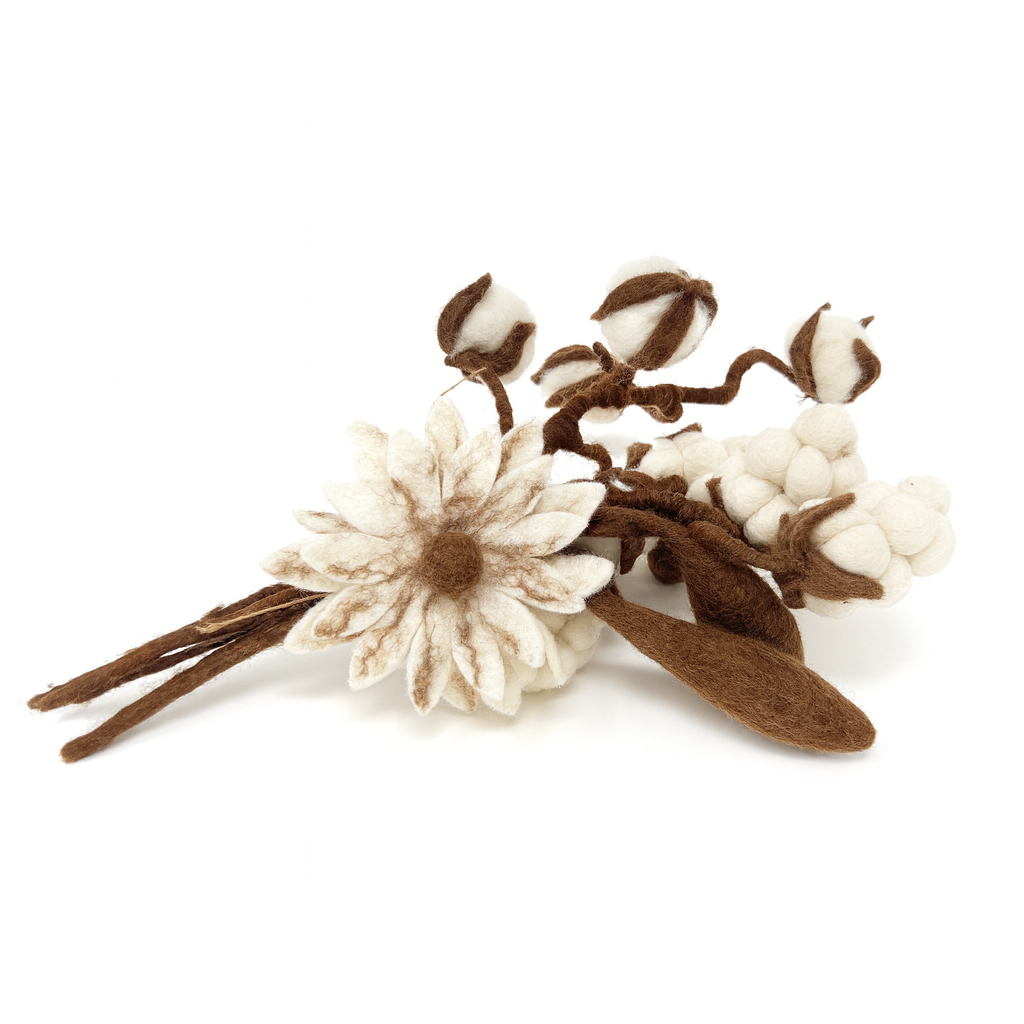 Floral arrangement with white flowers and brown leaves on a white background