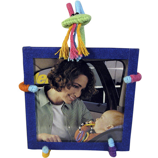 handmade tabletop picture frame with bendable handcrafted goat figure as the back easel.