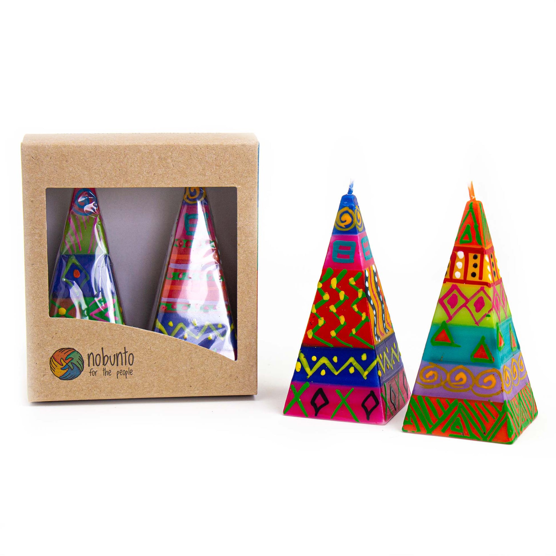 Colorful geometric-patterned candles with a box labeled 'nubotio' on a white background