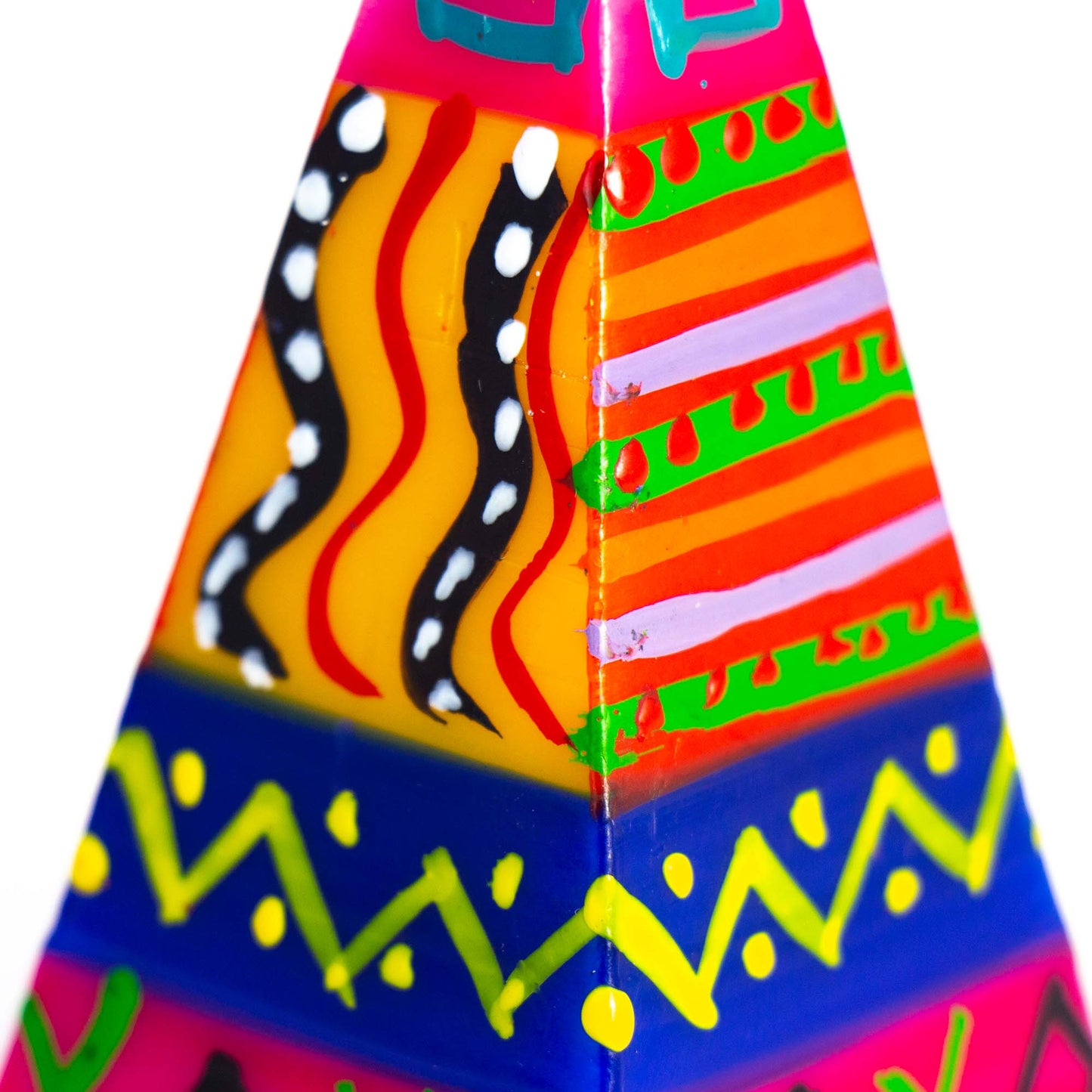 Colorful geometric patterned object on a white background