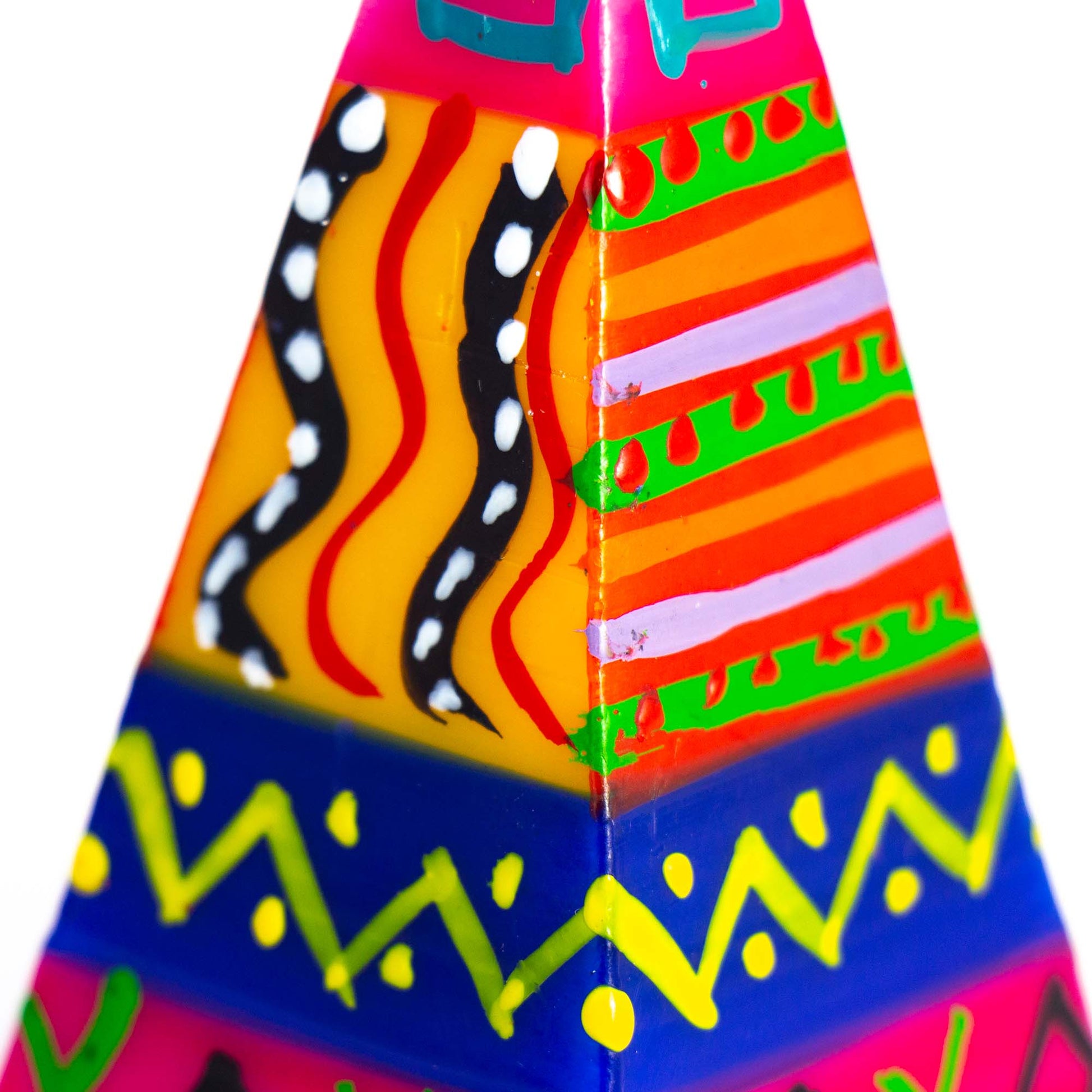 Colorful geometric patterned object on a white background