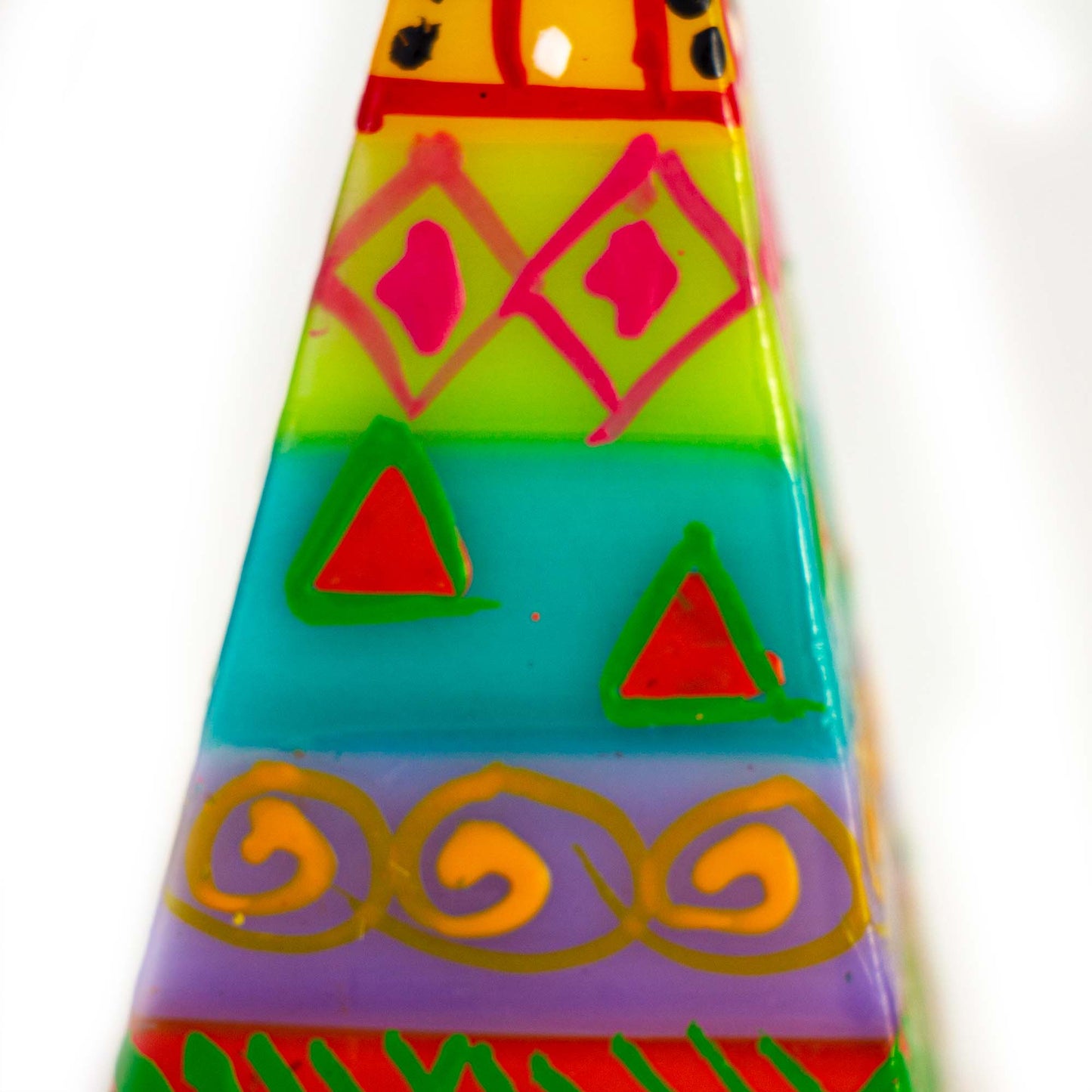 Colorful geometric patterned object on a white background