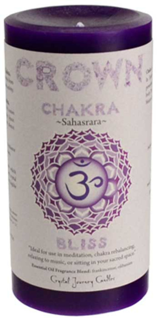Candle labeled 'Crown Chakra Bliss' with purple and white design on a white background