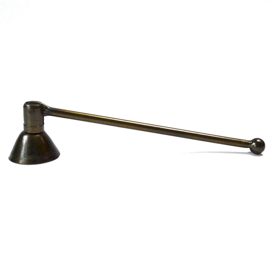 Bronze candle snuffer with a long handle on a white background