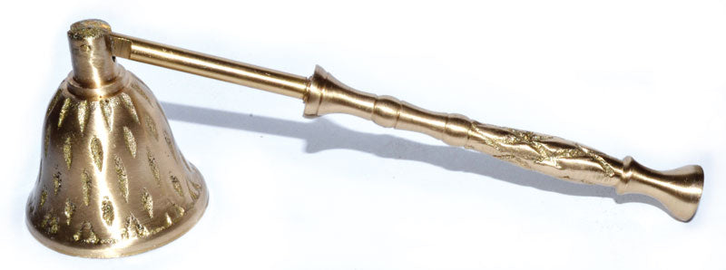 Brass candle snuffer on a white background