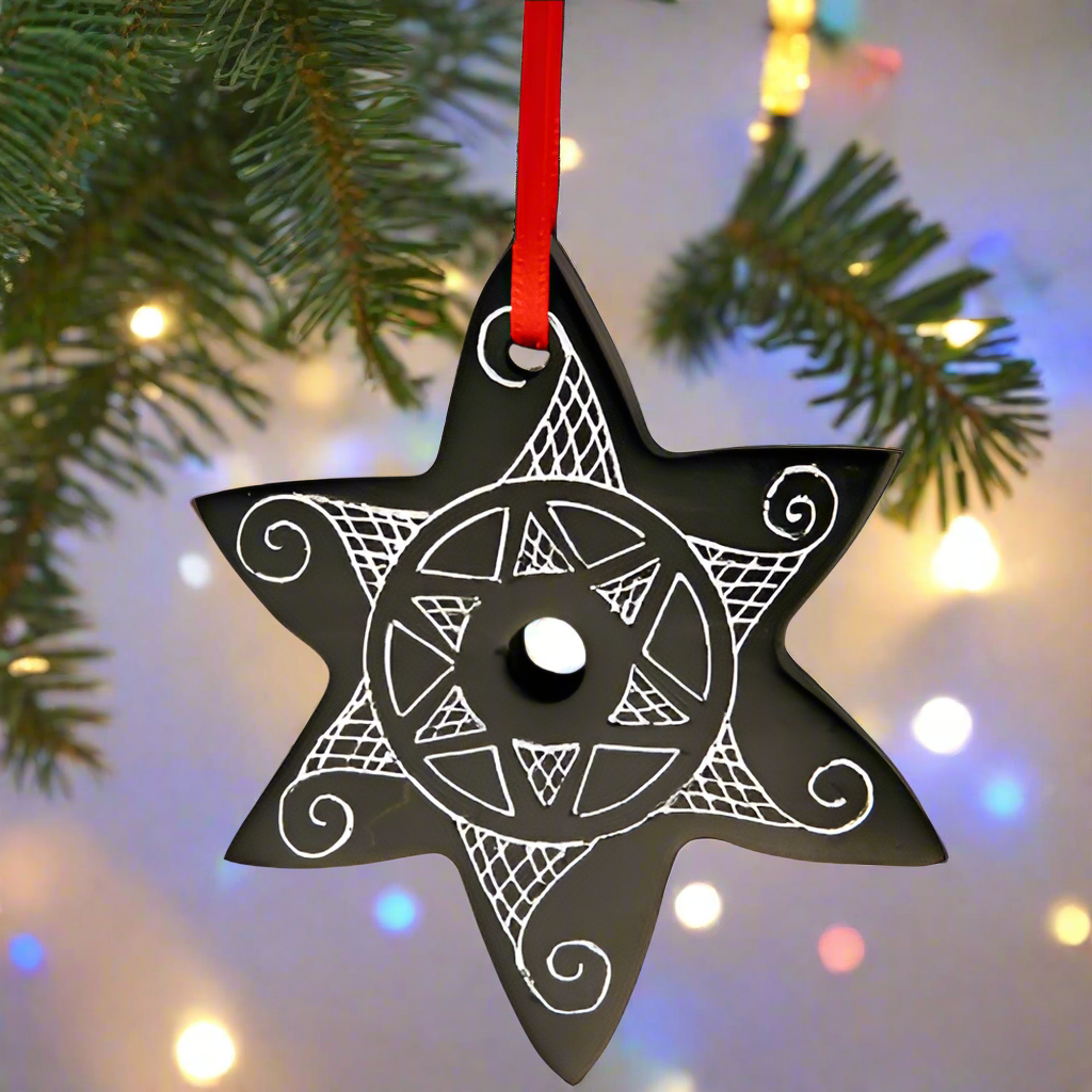 Adorno de estrella de carbón