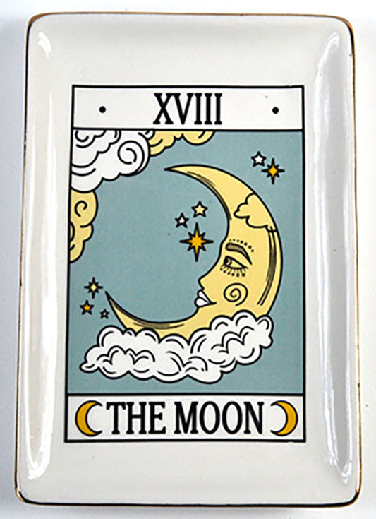 Decorative plate with 'The Moon' tarot card design featuring a crescent moon and stars.