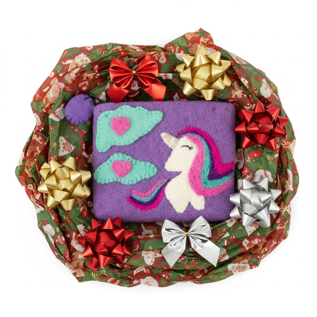 Decorative wreath with a unicorn pillow surrounded by colorful bows on a white background