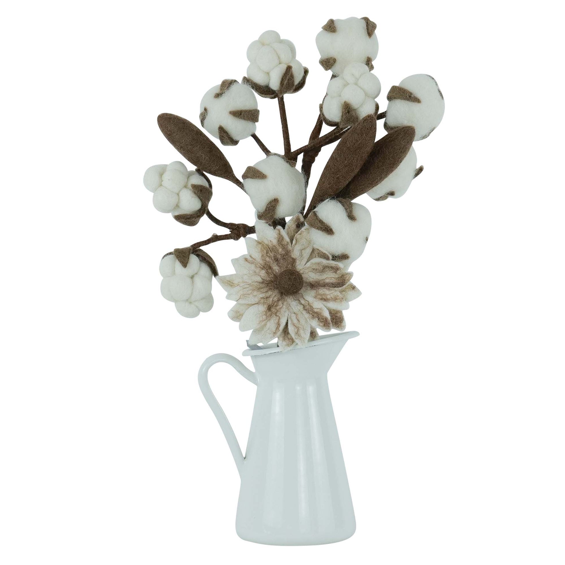 Decorative arrangement with cotton-like flowers and a sunflower in a white pitcher on a white background