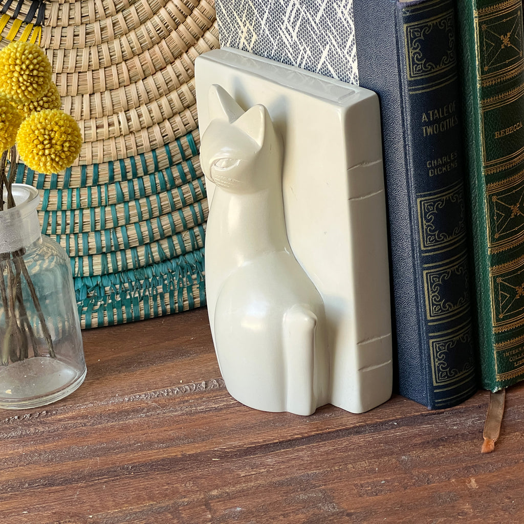 side view of hand carved soapstone cat bookend fair trade imported from Kenya