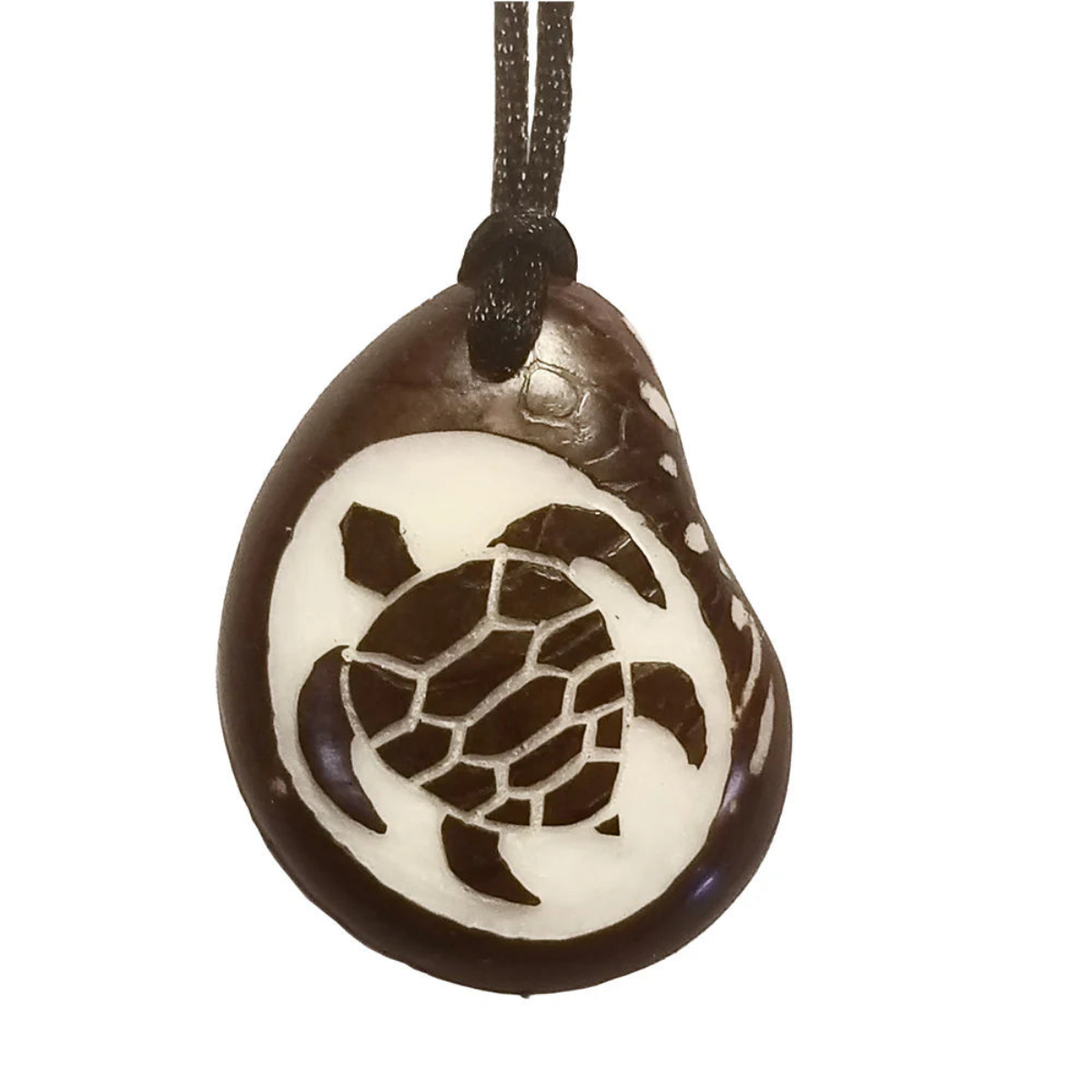 Pendant with turtle design on a white background