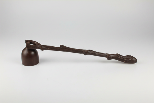 antiqued branch style candle snuffer on a white background
