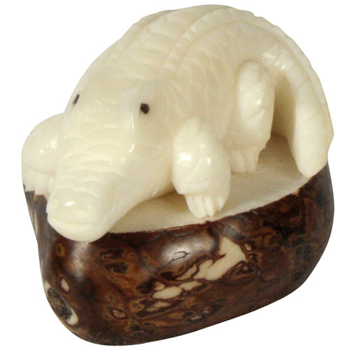 <center>Alligator Tagua Figurine </br>Crafted by Artisans in Ecuador </br>Measures 1-1/4” high x 1-3/4” wide x 2” long</center>
