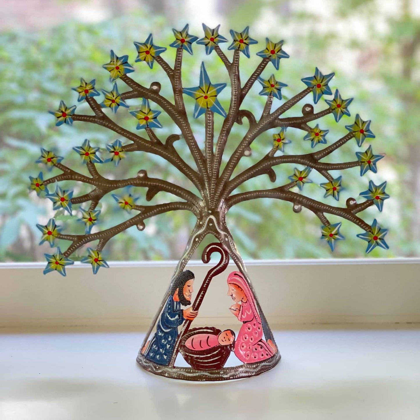 Belén haitiano de mesa con tambor de metal y estrellas fugaces azules