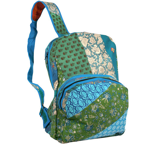 <center>Blue & Green Patchwork Backpack </br>Crafted by Artisans in India </br>Measures 17” high x 12-1/2” wide x 6-1/2” deep</center>