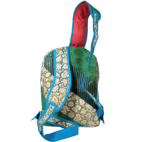 <center>Blue & Green Patchwork Backpack </br>Crafted by Artisans in India </br>Measures 17” high x 12-1/2” wide x 6-1/2” deep</center>