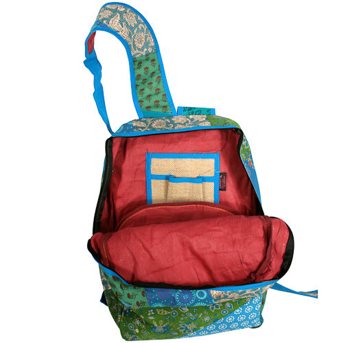 <center>Blue & Green Patchwork Backpack </br>Crafted by Artisans in India </br>Measures 17” high x 12-1/2” wide x 6-1/2” deep</center>