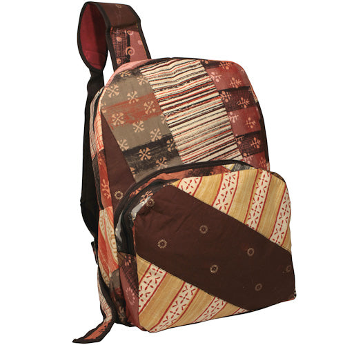 <center>Earth Tone Patchwork Backpack </br>Crafted by Artisans in India </br>Measures 17” high x 12-1/2” wide x 6-1/2” deep</center>