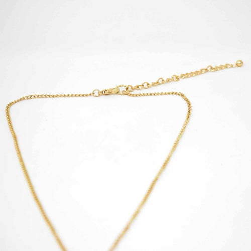 Collar con colgante de cono en tono dorado - Comercio justo - India